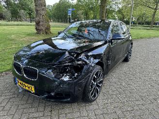 skadebil bromfiets BMW 1-serie  2014/1